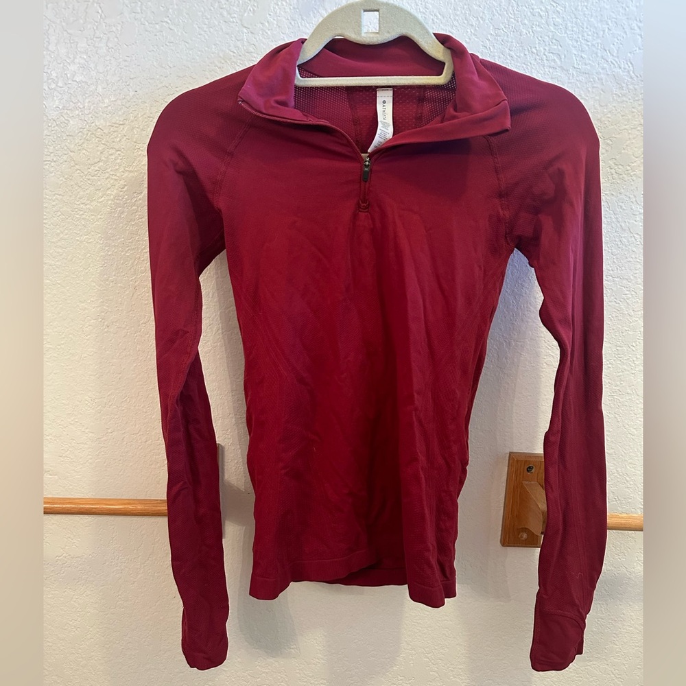 Like New Athleta Burgundy long sleeve half-zip.